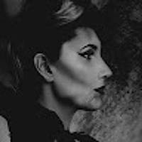 Grace M.