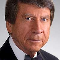 E. Dennis B.