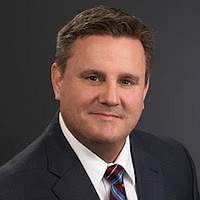 John B.