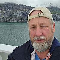 Dan E.